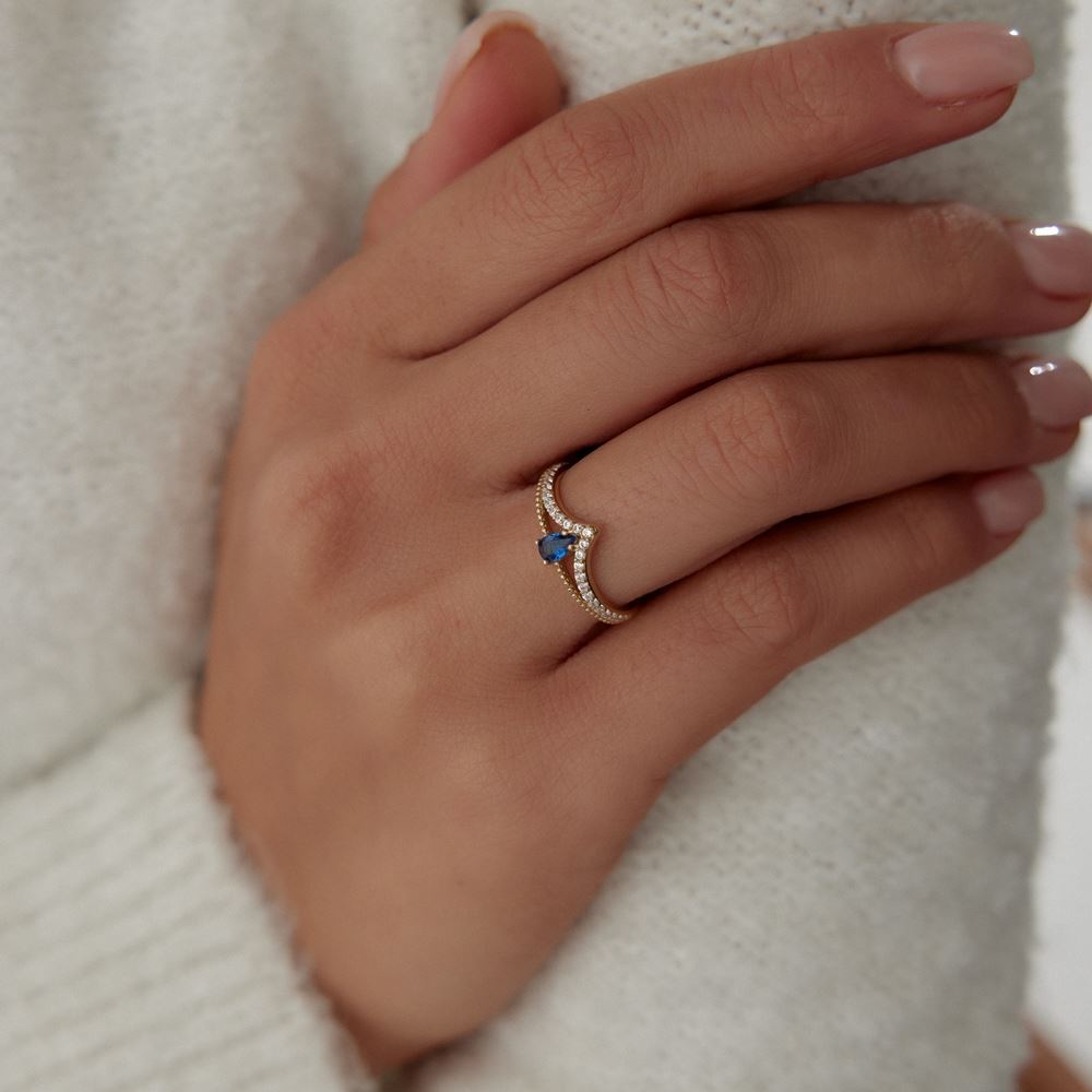 Beyaz Baget Damla Mavi Taşlı Yüzük